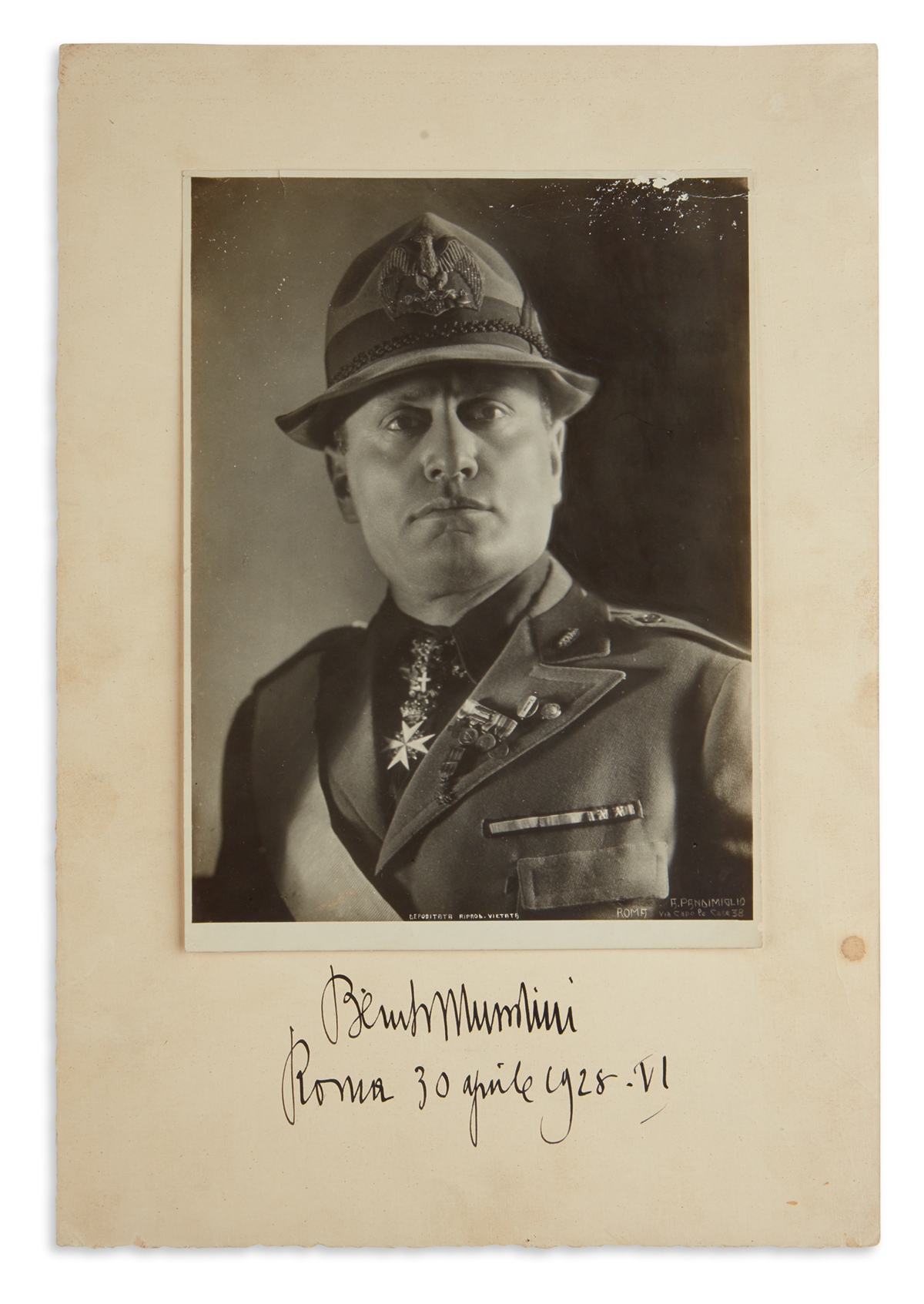 BENITO MUSSOLINI. Photograph dated and Signed, as Head of Government, bust portrait by Pandimiglio, showing him...